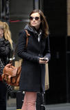 th_17401_Preppie_Olivia_Wilde_checking_out_of_her_hotel_in_London_6_122_62lo.jpg